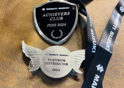 Achiever's Club Medal awarded to Maroor Motors by MSIL.